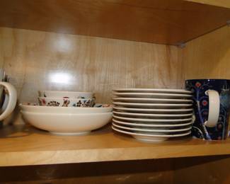 Plates, and mugs and bowls, all matchy matchy for snack time