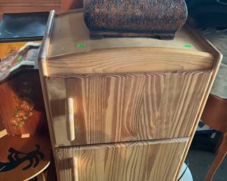 Small cabinet shaped like a refridgerator