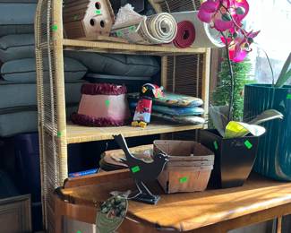 Antique display cabinet in front and wicker in the back