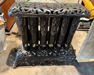 Victorian cast iron parlor stove "jeweled"