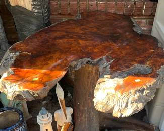 Burl live edge table with root base