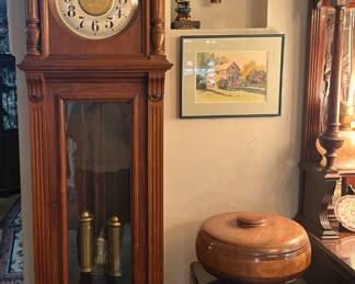 Junghans tall case weighted clock - works great. Also, gongs