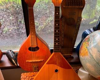 3 of 11 different stringed instruments