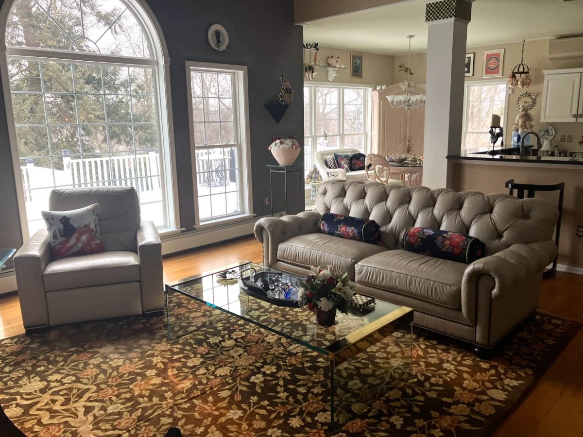Leather Ethan Allen Couch & Chair; Ornate Rug; Glass Top Coffee Table