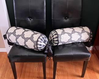 Black leather high boy chairs with MacKenzie Childs pillows