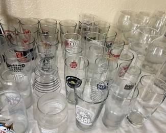Collection of assorted craft brewery pint glasses