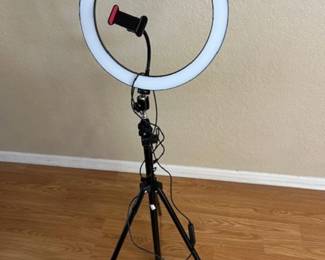 LED ring light with a tripod stand and phone holder