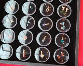 Assorted Gold jewelry including several Gold coin rings 