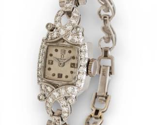 Lot 7
Omega (Swiss Geneva) 14k White Gold and Diamond Wrist Watch