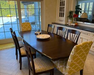 Dining Table 72" long has one leaf with makes it 92" long