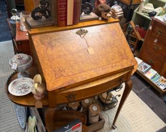 vintage secretary, books, cute lamp with dog shade