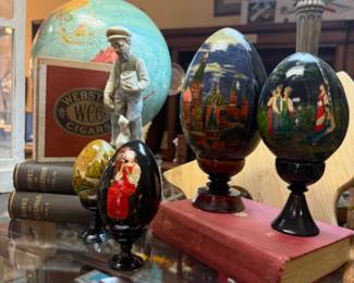 decorative eggs, books, gloves, decorative figurines