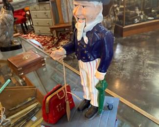 Vintage Cast Iron Uncle Sam mechanical coin bank 