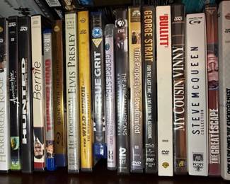 Collection of DVDs including Documentaries, TV Series, and Fitness Programs