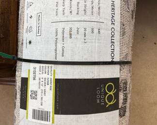 Rolled Rugs with Floral and Geometric Patterns