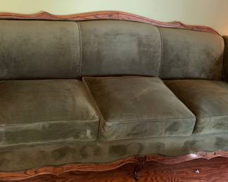 Dark green velvet like sofa