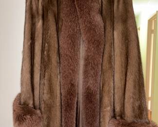 Absolutely stunning brown pink coat with fox trim. This was kept cold stored and is in perfect condition.