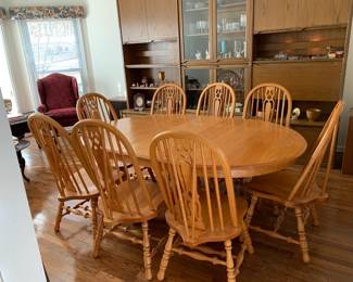 #1	Oak amish oval dining table with 1 leaf 8 chairs  60-72x44x30	 $340.00 
