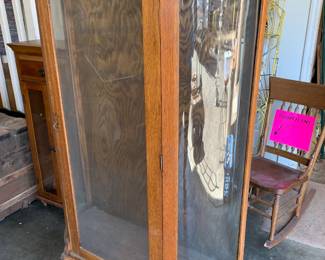 #22	wood glass front and side display cabinet no shelve on wheel 36x13x58	 $65.00 
