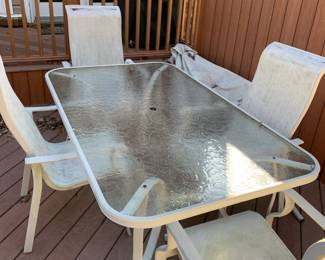 #54	case alumin table 4 chair s with umbrella glass table as is seat 66x40x28	 $75.00 
