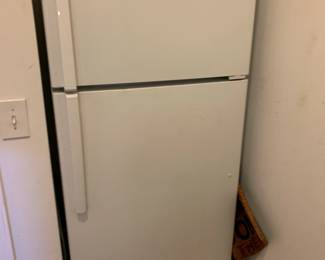 #14	ge freezer top metal shelves ge 16 frig  almond color	 $100.00 

