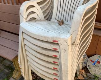 #55	8 plastic chairs white 	 $40.00 
