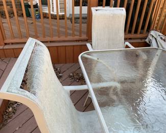 #54	case aluminum table 4 chair s with umbrella glass table as is seat 66x40x28	 $75.00 
