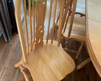 #1	Oak amish oval dining table with 1 leaf 8 chairs  60-72x44x30	 $340.00 
