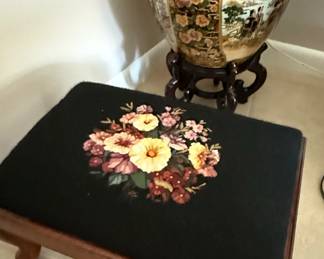 Vintage Needlepoint Footstool with Floral Design on Black Background