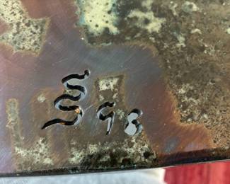 Taos artisan cast iron dining table signed SS 1998 - signature