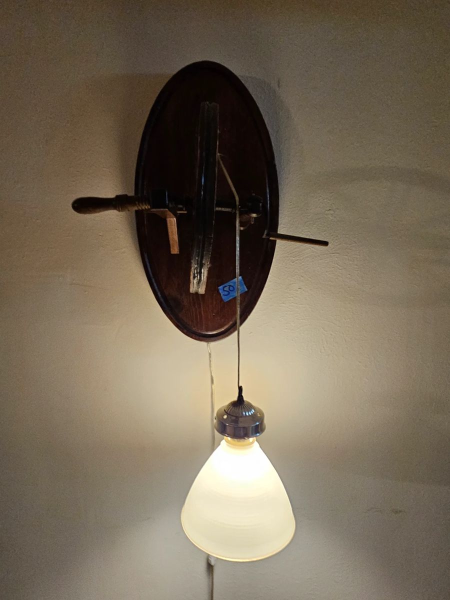 Leftover from weeks estate sale. This wall lamp is pretty unusual I've never seen one like this before. $50