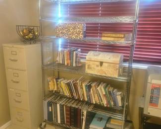 Tall metal open shelf on wheels
$150