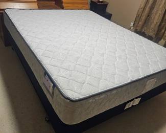 Almost new ( if not totally new)
Queen mattress on metal frame $125.00 wooden headboard behind Queen bed with storage $50.00

