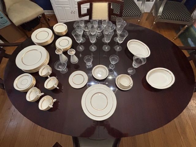 Lenox Imperial china and crystal stemware.  Eight full placesettings, plus additional pieces and serving bowls.  Nine water glasses, six cordial glasses, four sherbet, and one claret glass.
