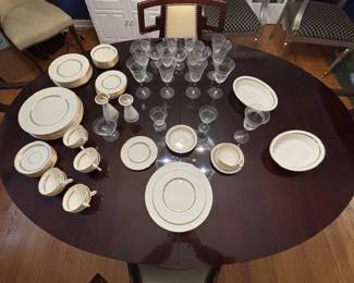 Lenox Imperial china and crystal stemware.  Eight full placesettings, plus additional pieces and serving bowls.  Nine water glasses, six cordial glasses, four sherbet, and one claret glass.