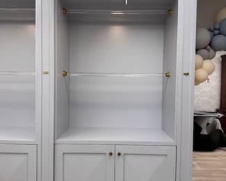 Custom Built Book Cases. Three-Piece Center Unit Measures 166" W x 25" D x 104" H. Two Single Unit Cases Measures 53" W x 25" D x 104" H. Photo 2 of 2.