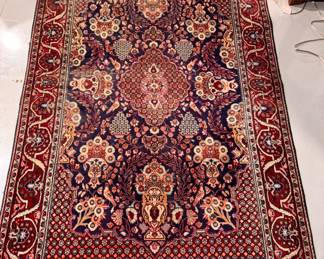 Persian Wool Rug. Measures 6' 11" x 4' 3". Photo 1 of 4.