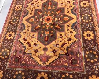 Persian Style Wool Rug. Measures 5' 6" x 7' 10". Photo 1 of 3.