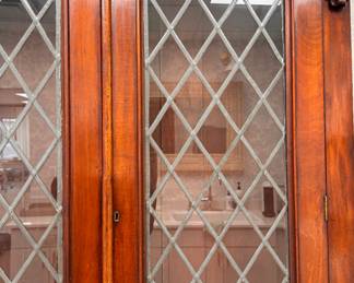 Antique Flame Mahogany Bookcase with Lead Glass Doors. Measures 49" x 18" D x 90" H. Photo 2 of 4.