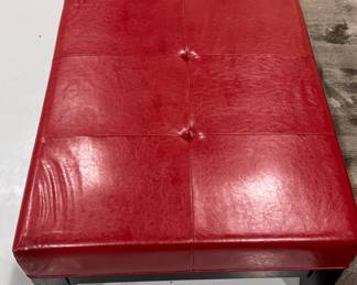 Red Leather Ottoman with Ebonized Wood Base. Measures 31" W x 48" W x 16" H. Photo 2 of 2.