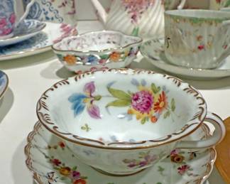 Dresden-style porcelain teacup and saucer set