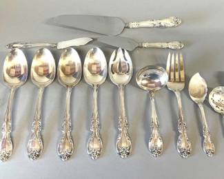 Gorham "Melrose" sterling silver serving pieces. A continuation of LOT 772. All pieces are not monogramed and include 4 large serving spoons, 8.5"L (339g), 1 slotted serving spoon, 8.5"L (75g), 1 cold meat fork, 8"L (78g), 1 gravy ladle, 6.5"L (70g), 1 jelly preserve, 6.25"L (34g), 1 sugar spoon, 6"L (34g), 1 slotted bon bon, 5"L (25g), 1 master butter knife, 7"L (38g), 1 pickle and 1 lemon fork (35g), 1 pie server and 1 cheese server. Marked anchor/lion/G/Gorham/sterling/ Melrose.