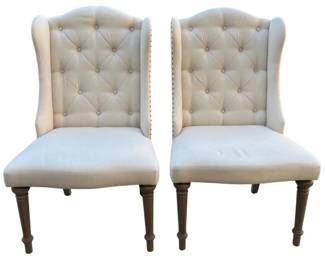 Pair of linen covered host and hostess chairs