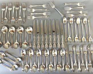 Gorham sterling silver flatware in the "Melrose" pattern. All pieces are not monogrammed, lot consists of 16 luncheon forks, 5.75"L (733g), 8 dinner forks, 7"L (494g), 8 dinner knives, 8.75"L, 8 ice teaspoons, 7.5"L (283g), 8 cream soup spoons, 6.25"L (328g) and 16 teaspoons, 6"L (583g). Marked lion/anchor/G/Gorham/sterling/Melrose. Serving pieces from this collection can be found listed as LOT 770.