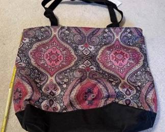 Many purses, handbags, totes. https://modestlambestatesales.hibid.com/