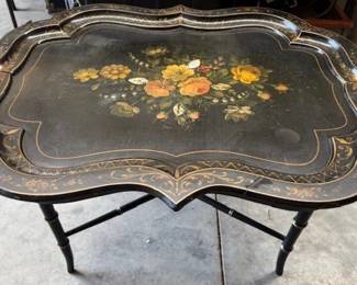 Black lacque / paintedd frame top table. https://modestlambestatesales.hibid.com/