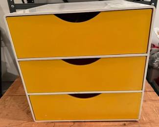 MCM plastic office organizer. https://modestlambestatesales.hibid.com/