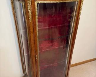 Antique French mahogany curved curio cabinet. Two shelves. https://modestlambestatesales.hibid.com/