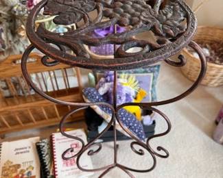 Plant stand. https://modestlambestatesales.hibid.com/