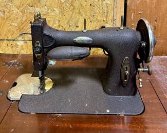Vintage White Sewing Machine ( Located in building #2 on the property)